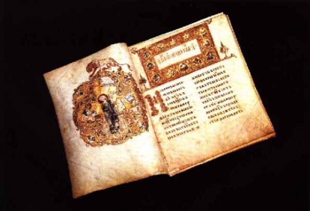 The Ostromir Codex, written in the Church Slavonic with many vernacular words, is famous for its brilliant miniatures. The opening of the Gospel of Saint John, with his Evangelist portrait.