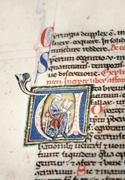 Inside the letter is a picture of a master in cathedra expounding on the Aphorisms of Hippocrates. Initial "V" rendered as "U" of "Vita brevis, ars vero longa", or "Life is short, but the art is long". "Isagoge", fol. 15b. HMD Collection, MS E 78.